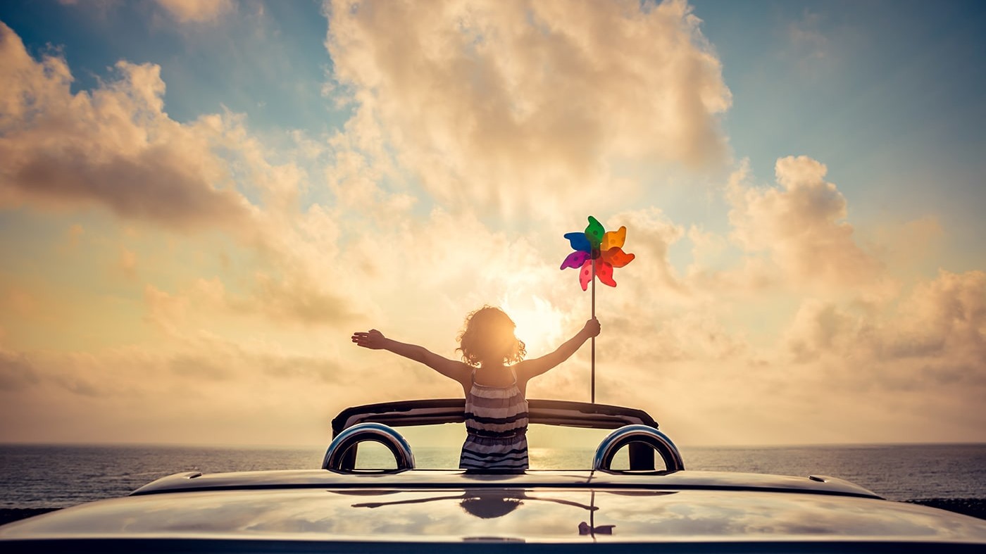 Excited woman on beach